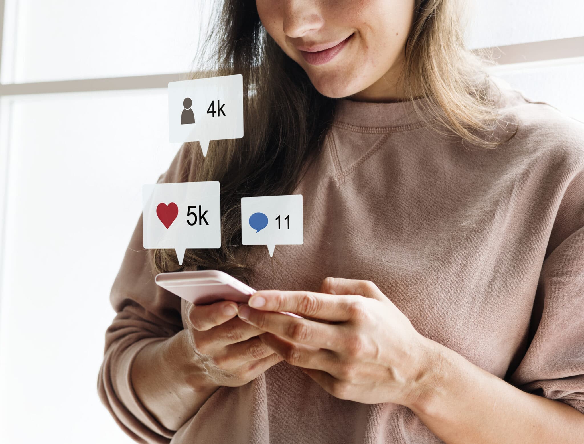 woman using a smartphone social media conecpt